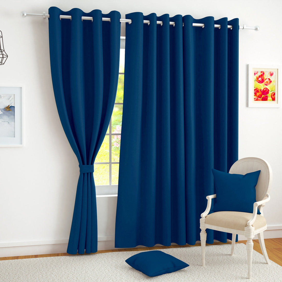 Navy blue blackout curtains on a bedroom window