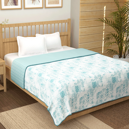 Story@Home reversible white and blue triangles cotton double dohar on a bed