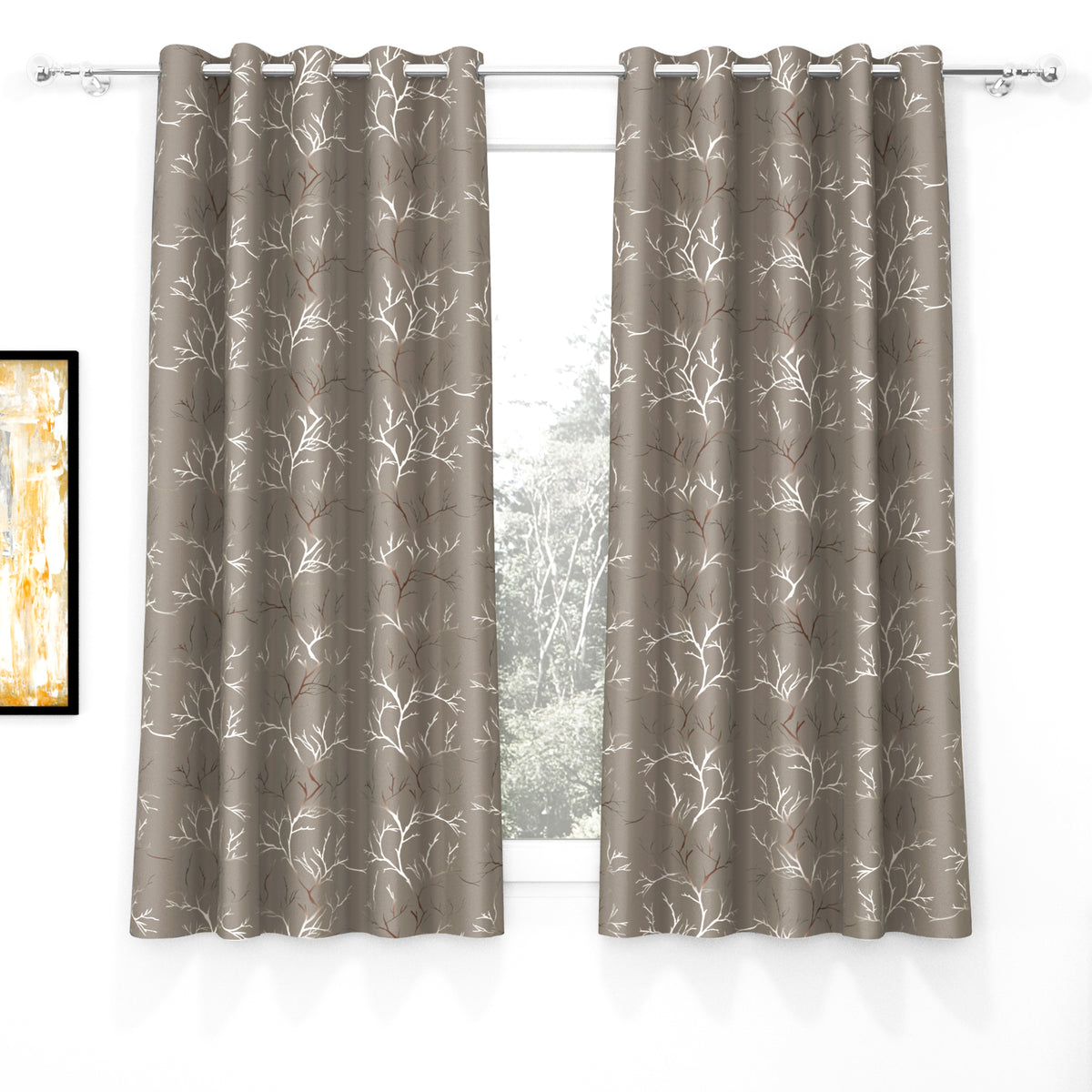 Two taupe blackout curtains with ivory and copper branch foil print, hanging on silver curtain rod with grommets