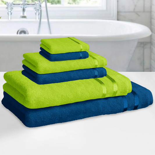 "Lime green and navy blue Story@Home towel set displayed in a bright bathroom setting."