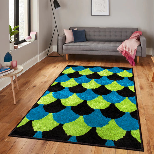 Colorful rug with blue, green, and black scallop patterns in a cozy living room with a gray sofa.