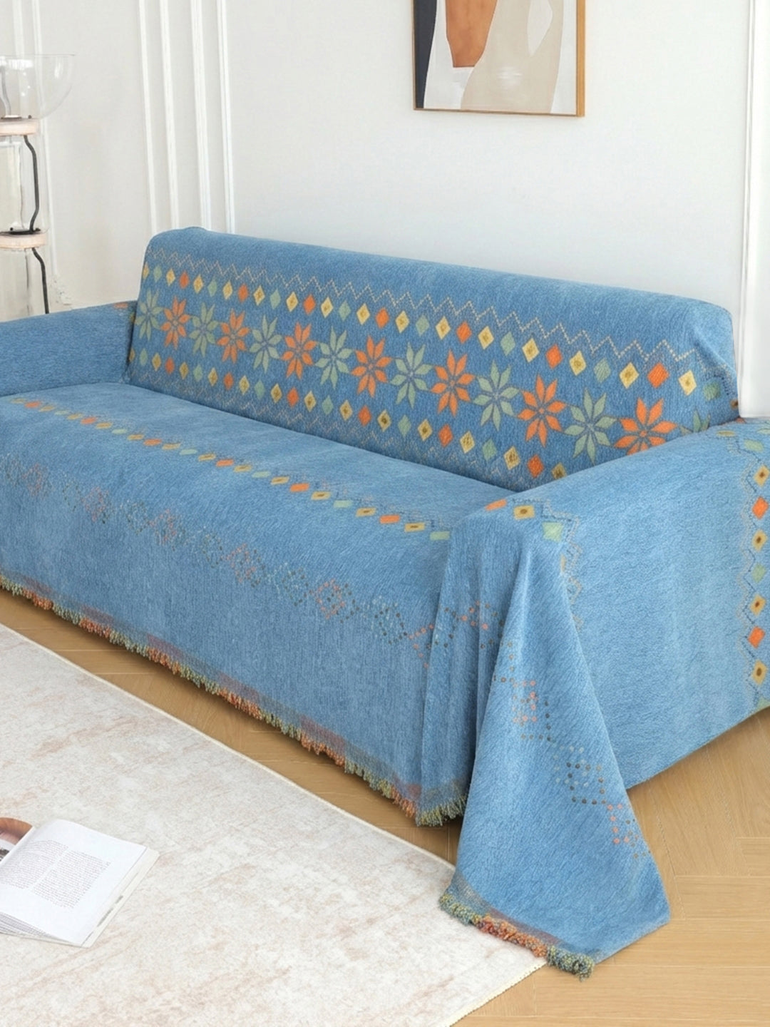 Blue Floral Border sofa throw styled in a living room