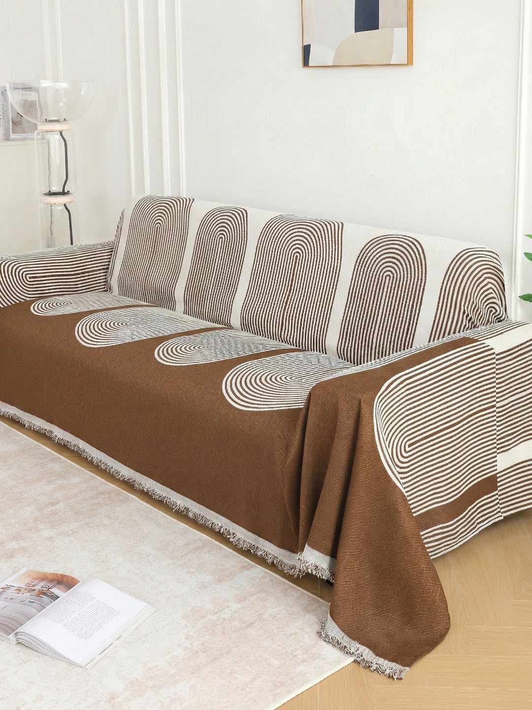 Brown Arch Geometric sofa throw styled in a living room