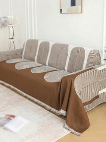 Brown Arch Geometric sofa throw styled in a living room