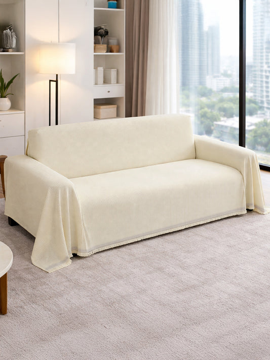Cream Solid chenille sofa throw cover on a 3 seater sofa