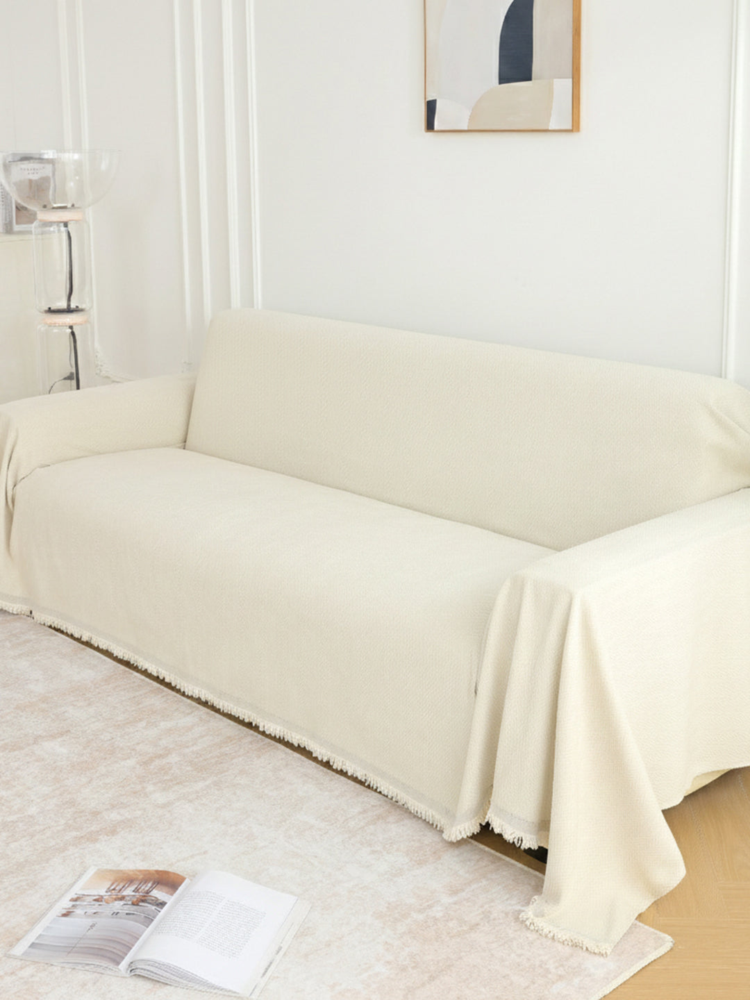 Cream Solid sofa throw styled in a living room