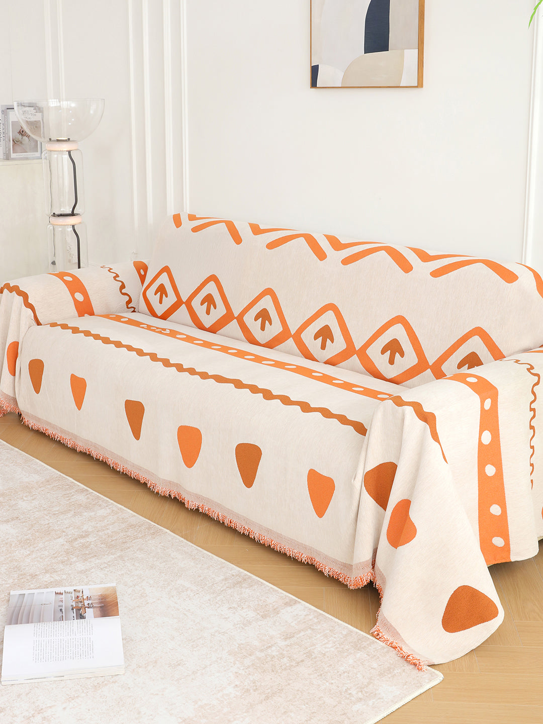 Orange Geometric sofa throw styled in a living room