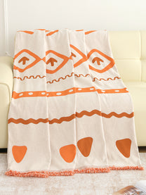 Full view of the Orange Geometric throw pattern