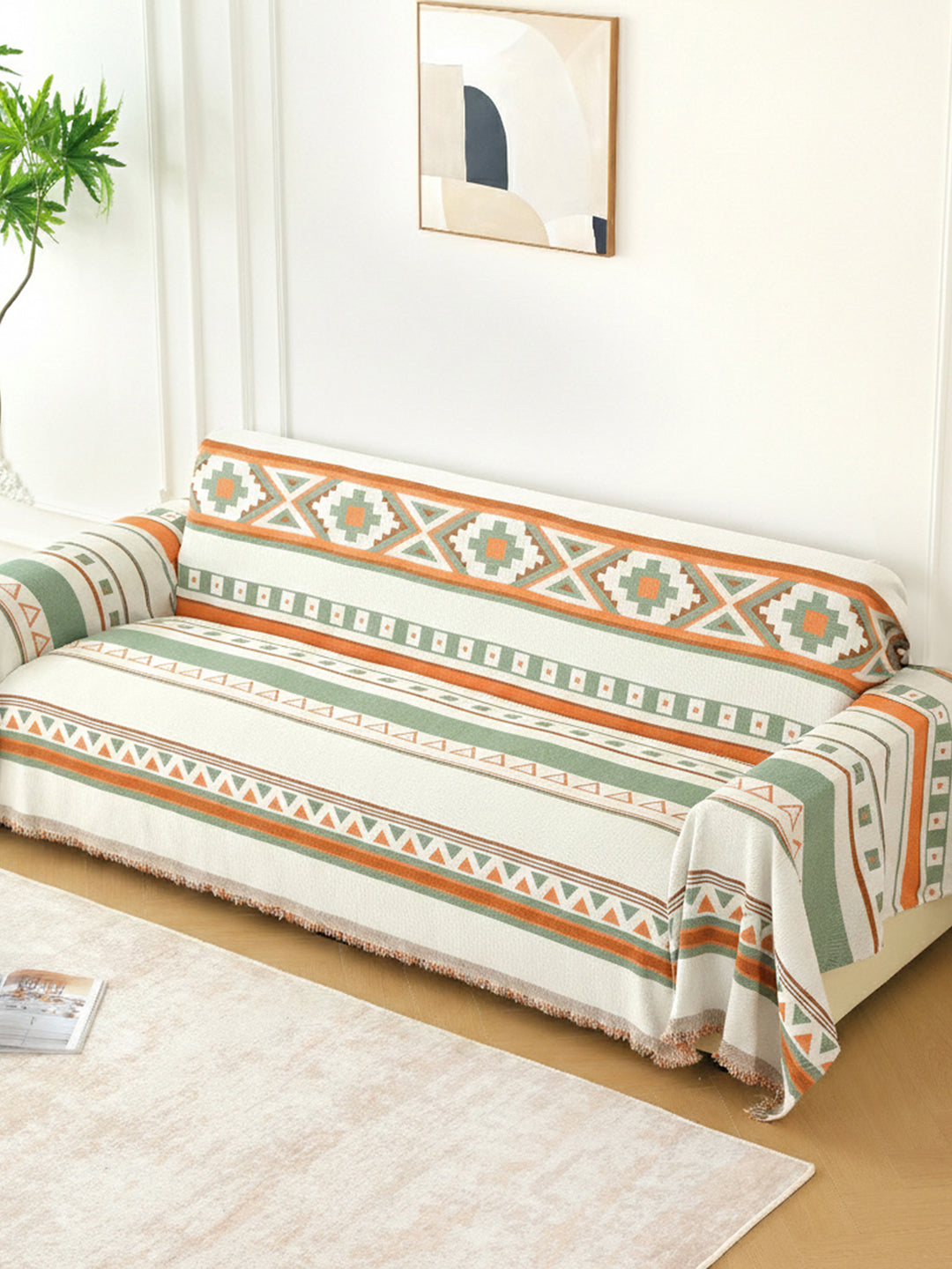 Orange & Sage Aztec sofa throw styled in a living room