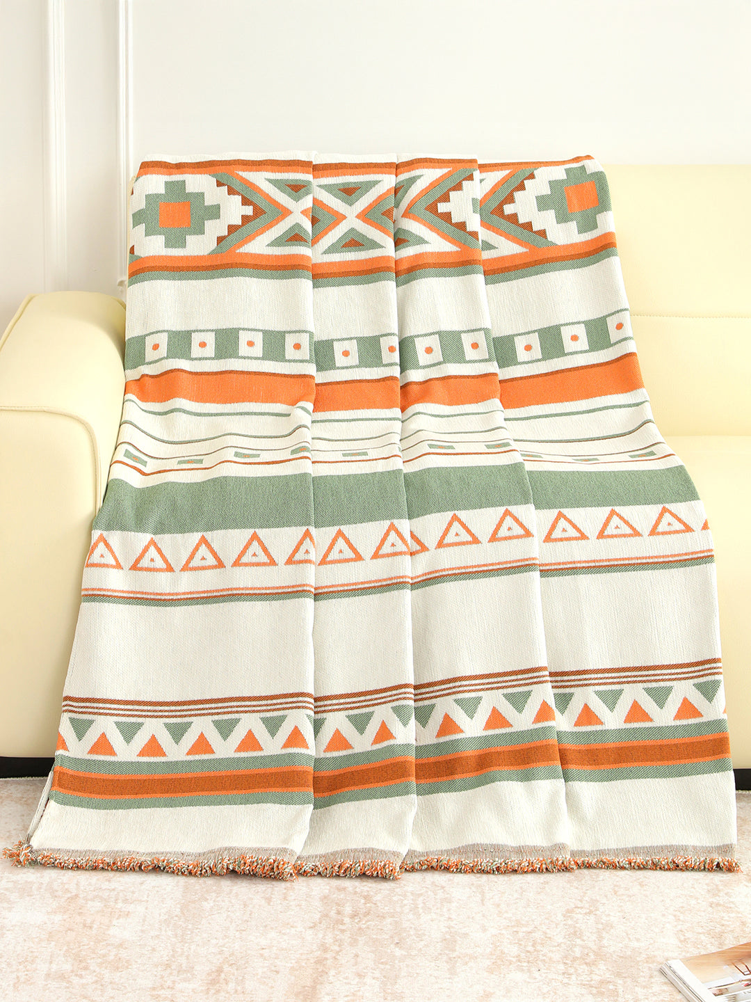 Full view of the Orange & Sage Aztec throw pattern