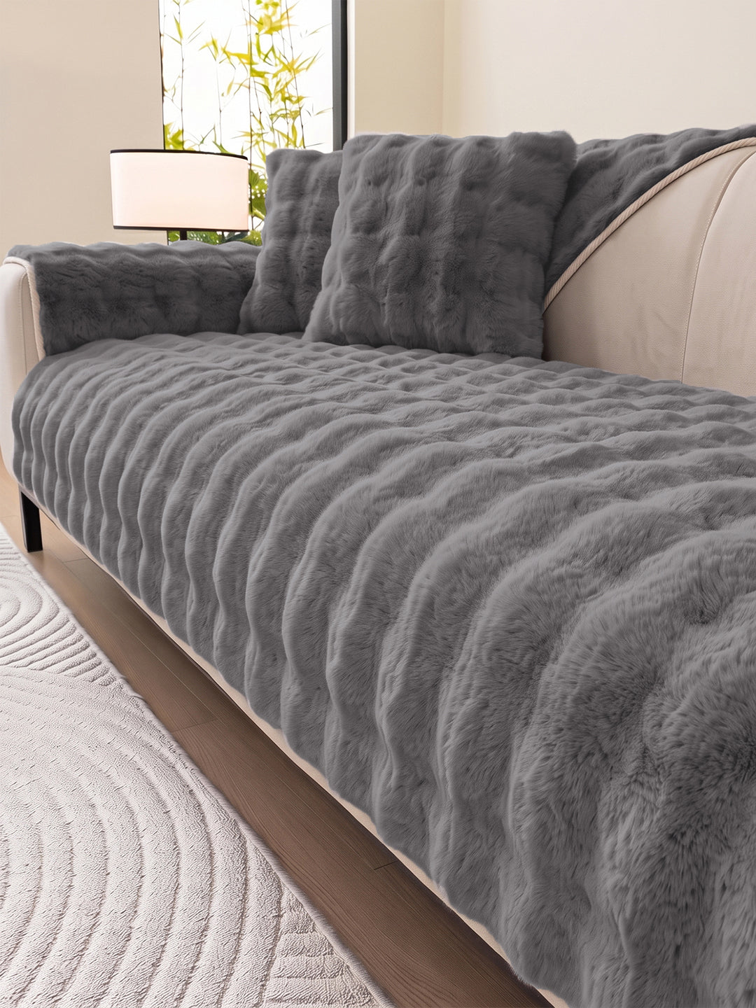 Grey sofa seat mat close-up