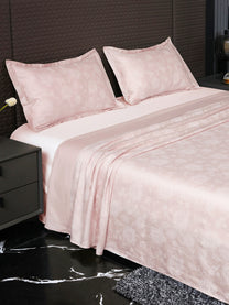 Heritage Blush bedsheet, side view with pillow covers