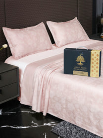 Bedsheet on bed with Ancient Weaves gift box