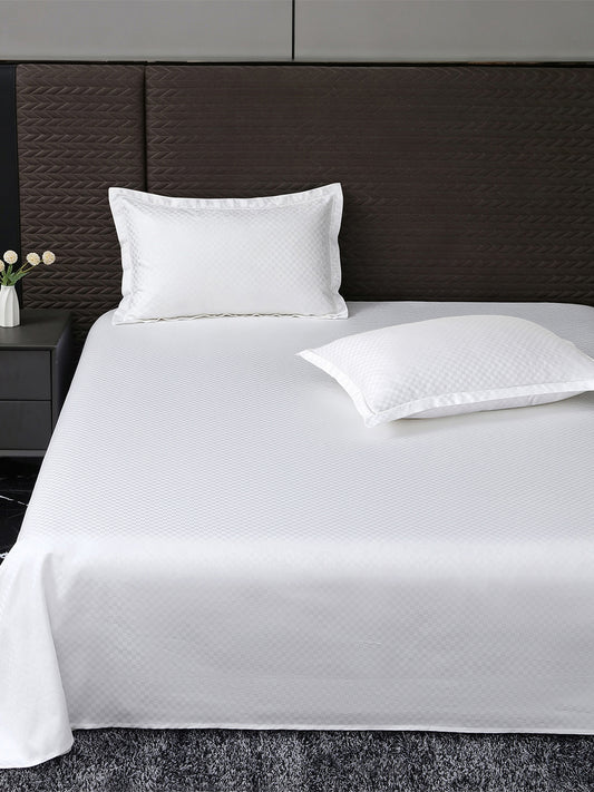 Heritage 500 TC Jacquard King Bedsheet – White Checkered on a king bed
