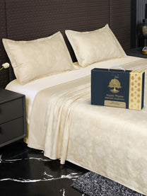 Bedsheet on bed with Ancient Weaves gift box