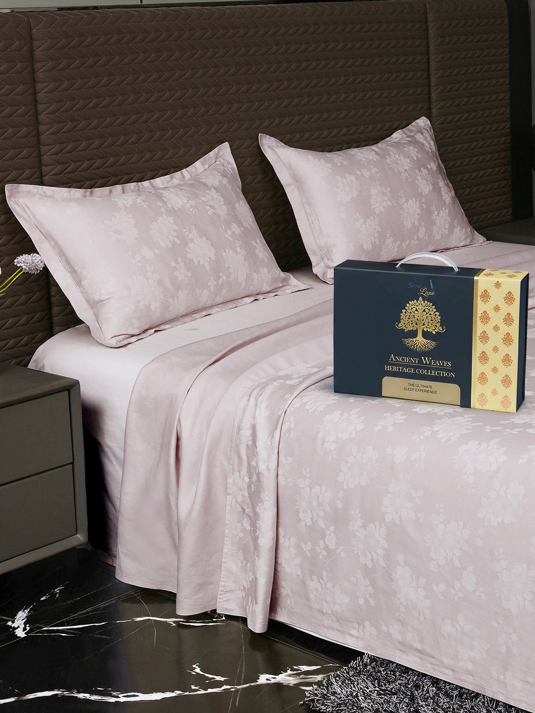 Bedsheet on bed with Ancient Weaves gift box
