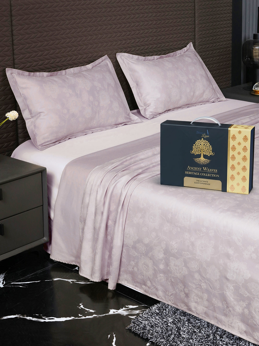 Bedsheet on bed with Ancient Weaves gift box