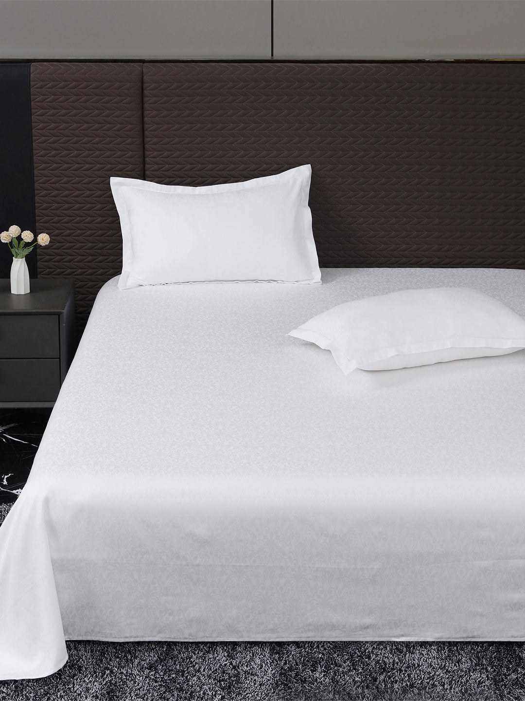 Heritage 500 TC Cotton Jacquard King Bedsheet – White Motif on a king bed