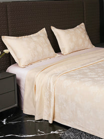 Heritage Peach bedsheet, side view with pillow covers