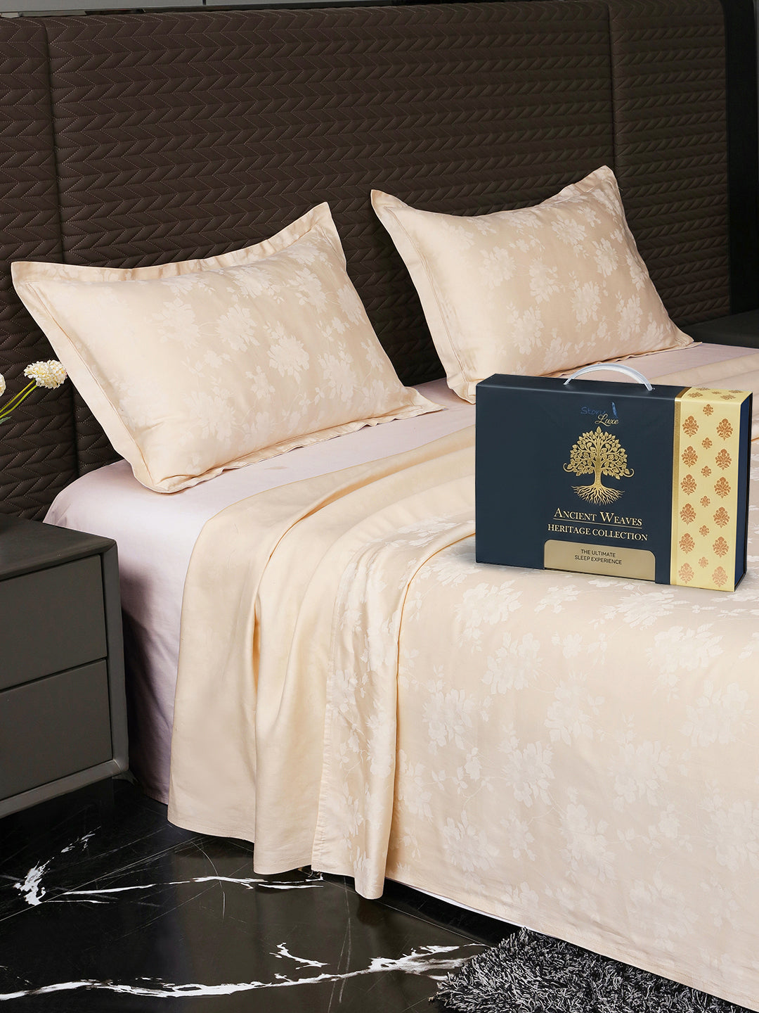 Bedsheet on bed with Ancient Weaves gift box