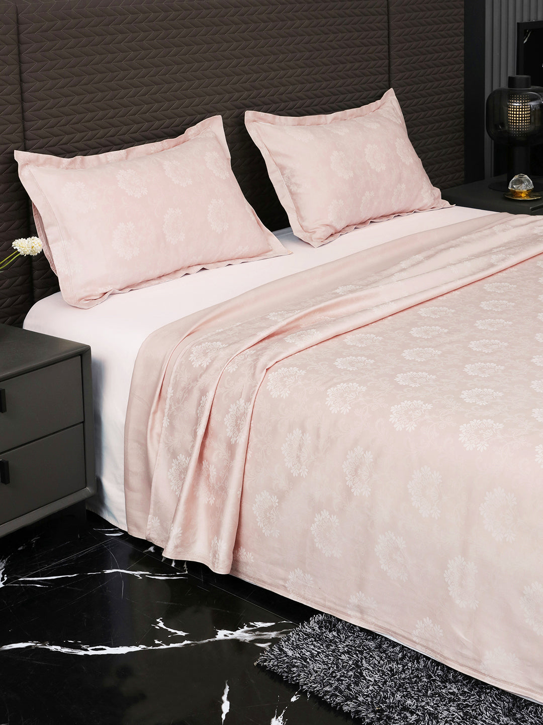 Heritage Pink jacquard bedsheet, side view with pillow covers
