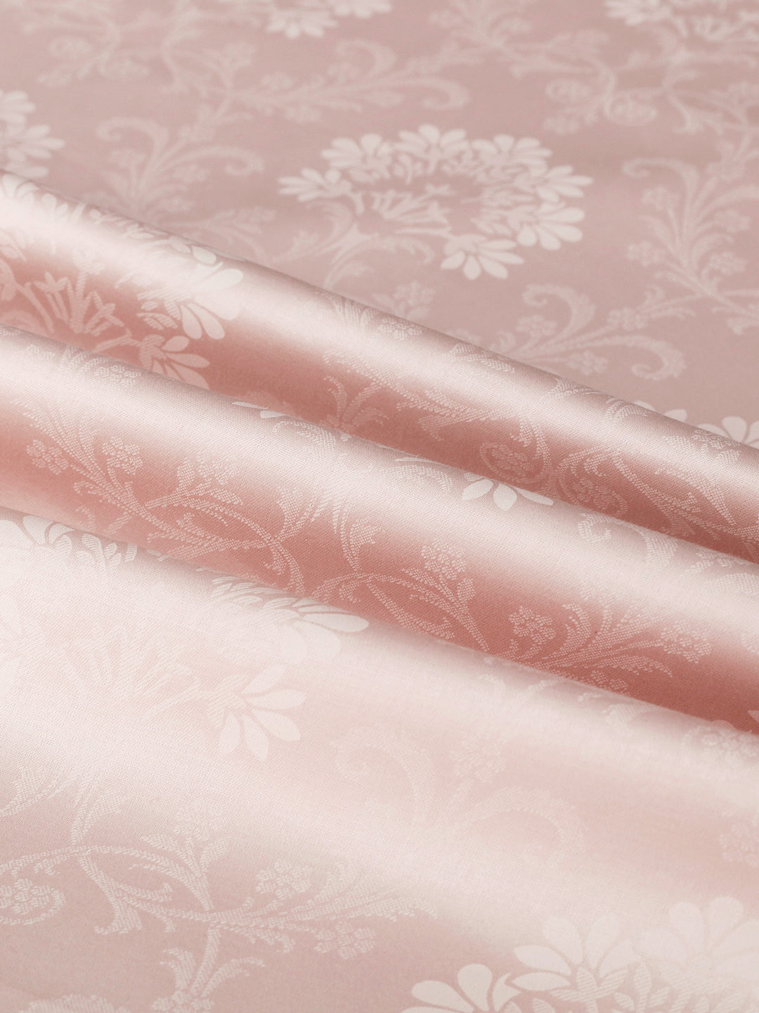 Close-up of the woven floral jacquard pattern
