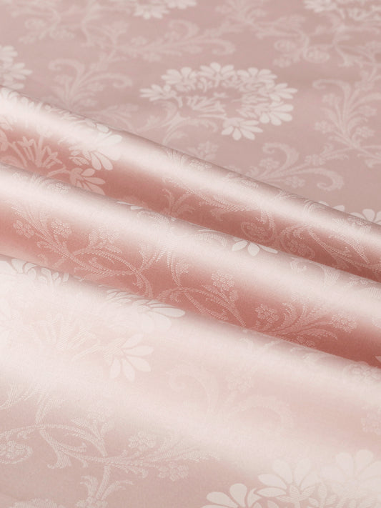 Close-up of the woven floral jacquard pattern