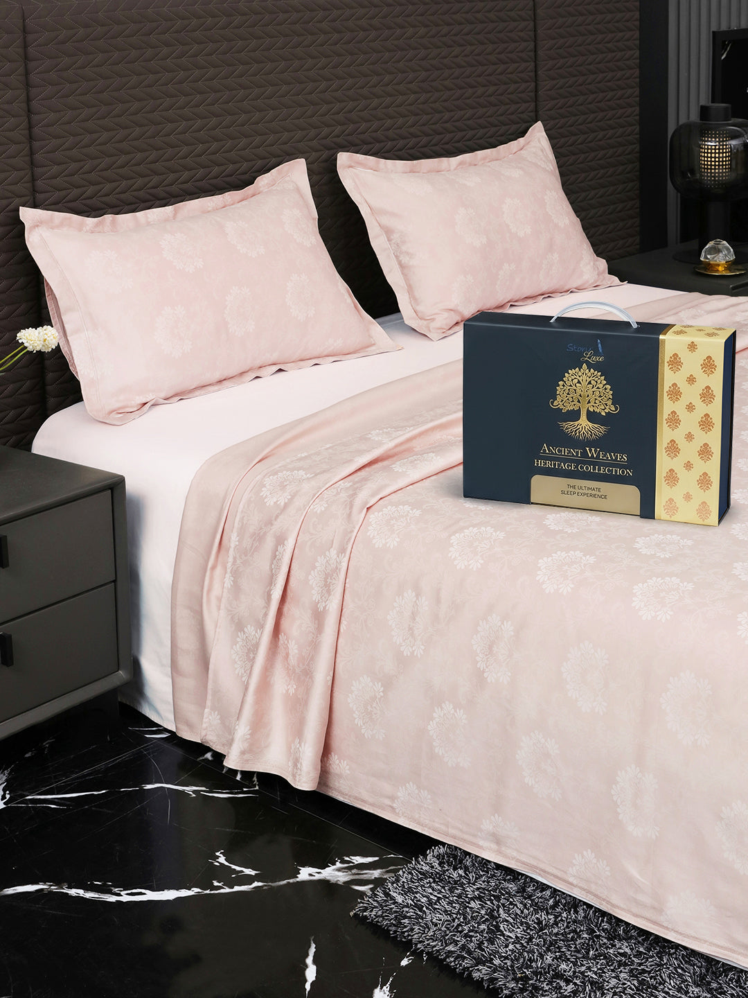 Heritage bedsheet on bed with Ancient Weaves gift box