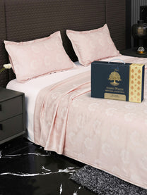 Heritage bedsheet on bed with Ancient Weaves gift box