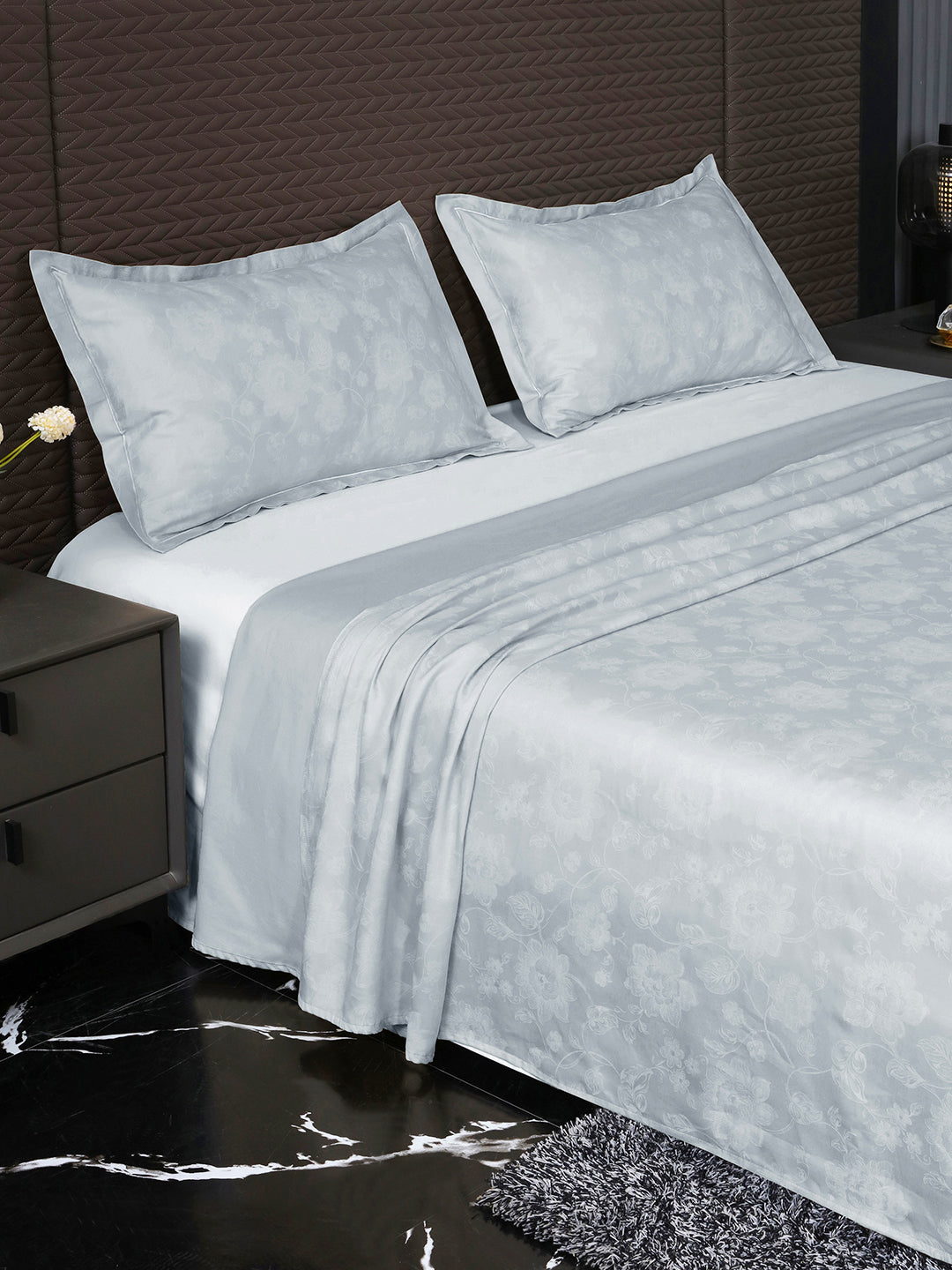 Heritage Powder Grey bedsheet, side view with pillow covers