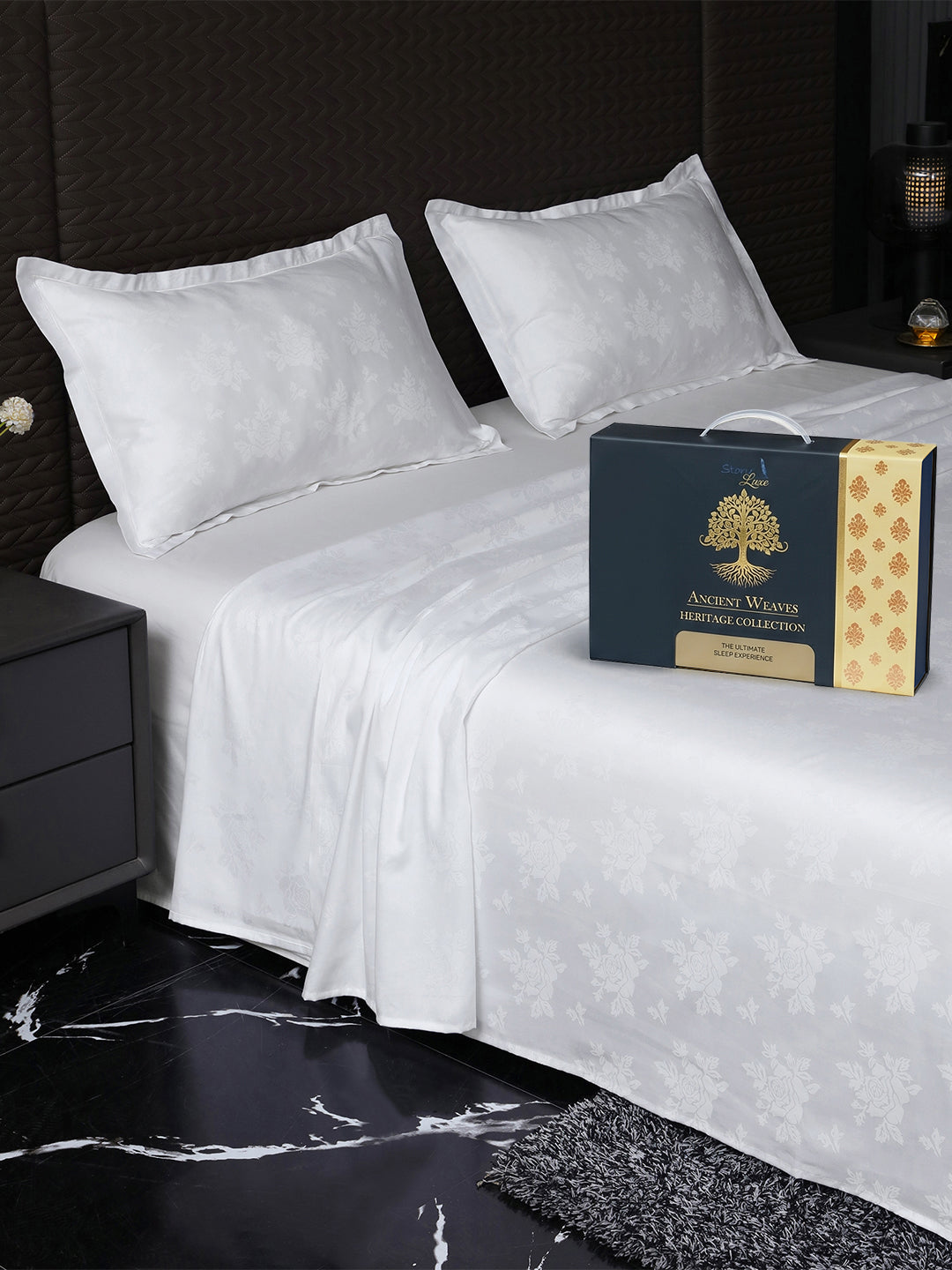 Bedsheet on bed with Ancient Weaves gift box