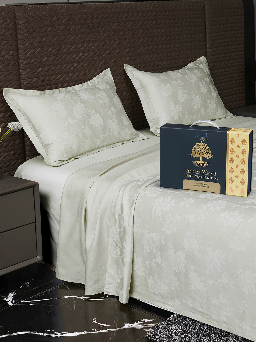 Bedsheet on bed with Ancient Weaves gift box