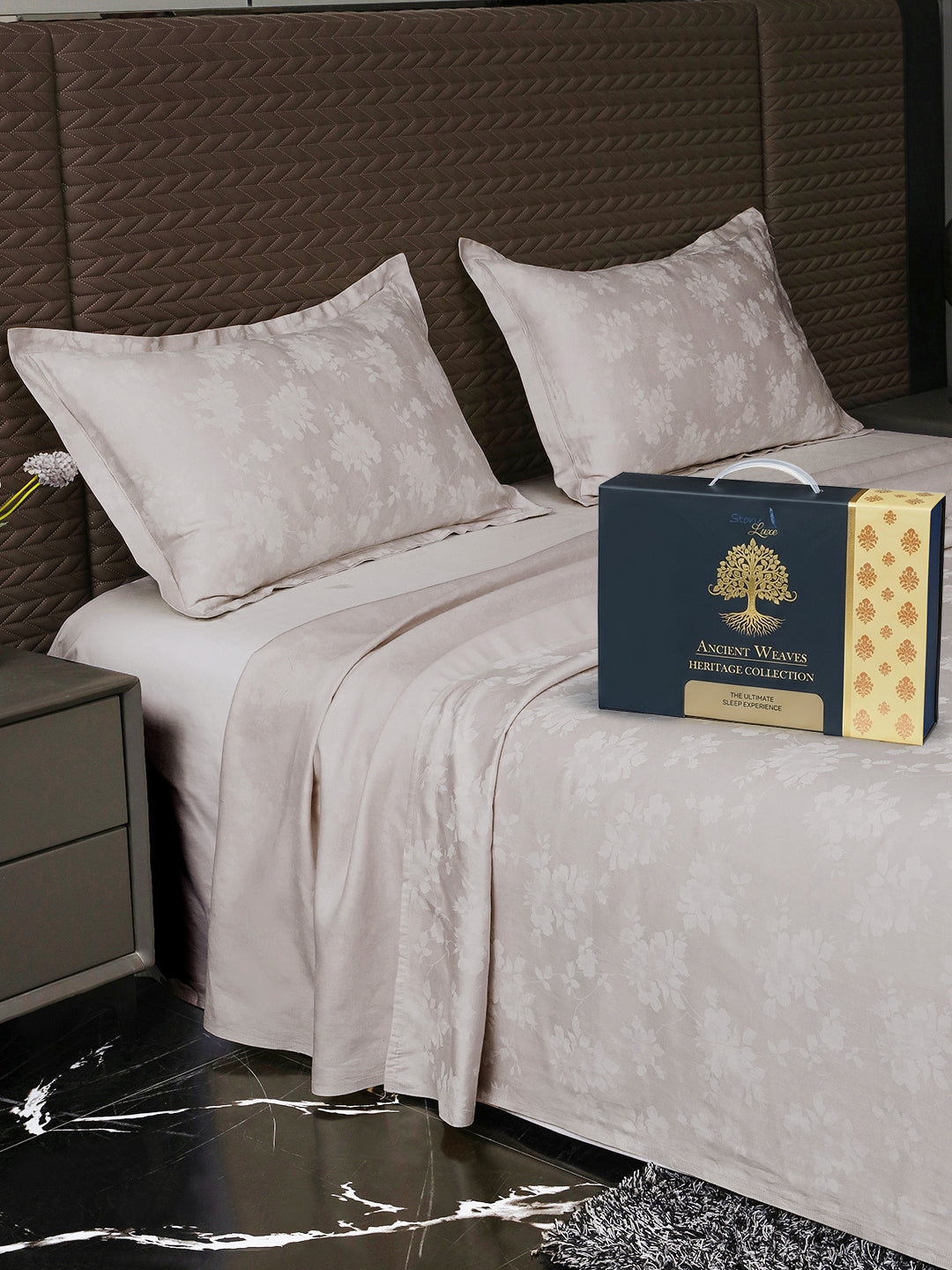 Bedsheet on bed with Ancient Weaves gift box