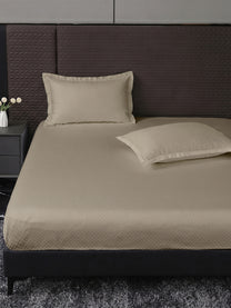 Heritage 500 TC Cotton King Fitted Bedsheet – Beige on a king bed