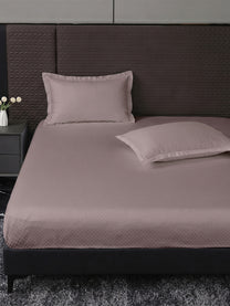 Heritage 500 TC Cotton King Fitted Bedsheet – Cameo Rose on a king bed