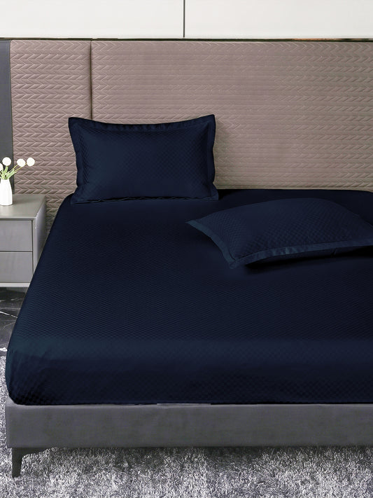 Heritage 500 TC Cotton King Fitted Bedsheet – Navy Blue on a king bed