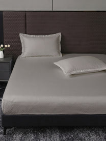 Heritage 500 TC Cotton King Fitted Bedsheet – Silver Grey on a king bed