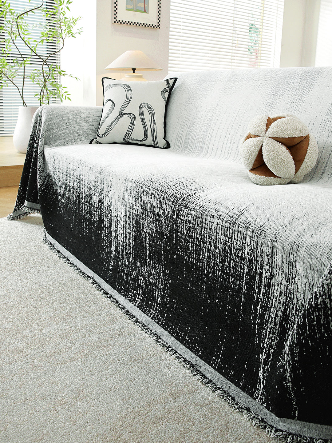 Black Ombre premium chenille sofa throw on a 3 seater sofa