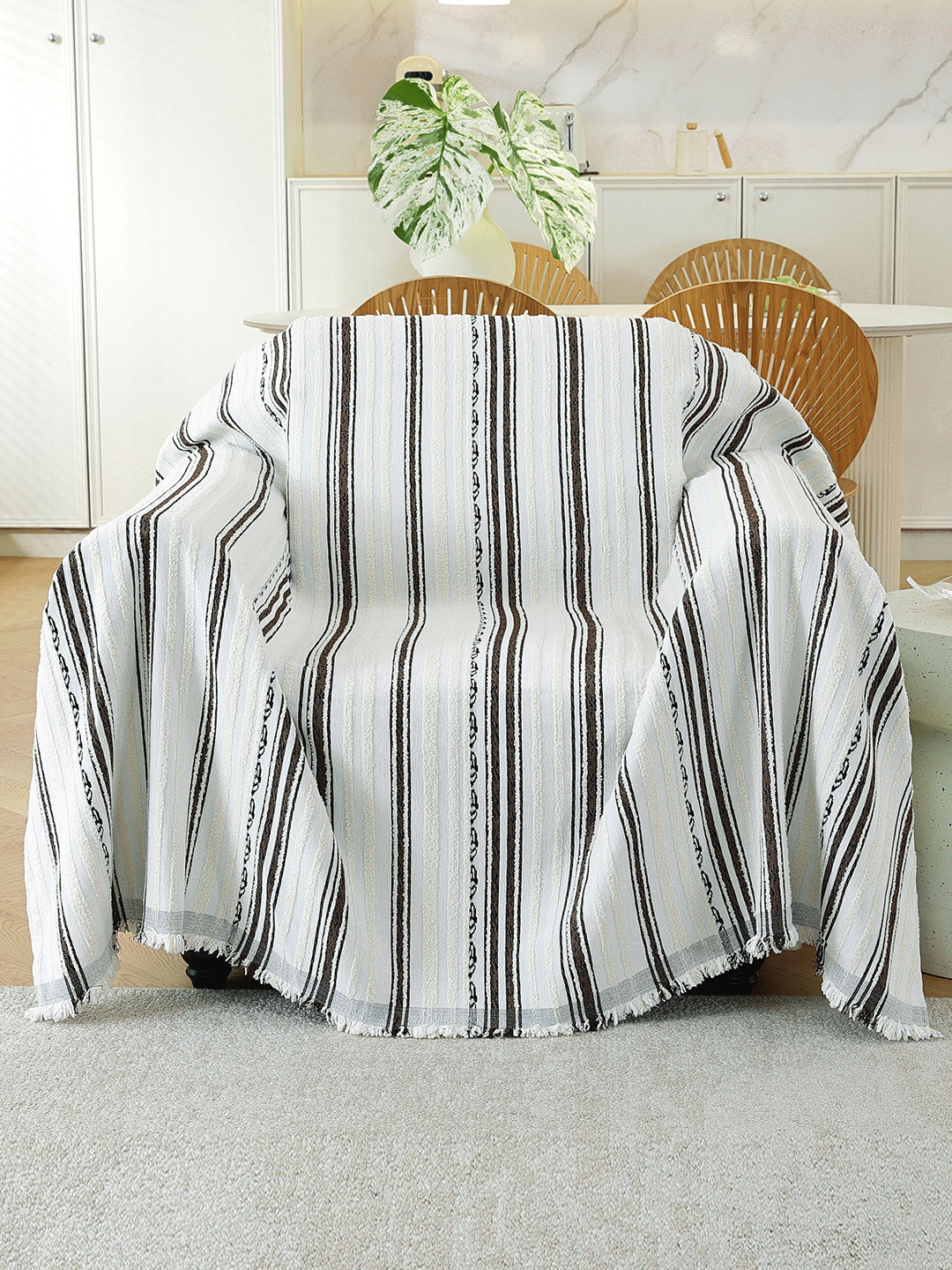Black & White Stripe throw on a single seater sofa