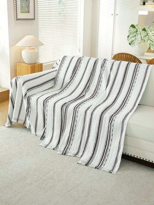 Black & White Stripe throw draped on a sofa