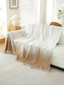Caramel Ombre throw draped on a sofa