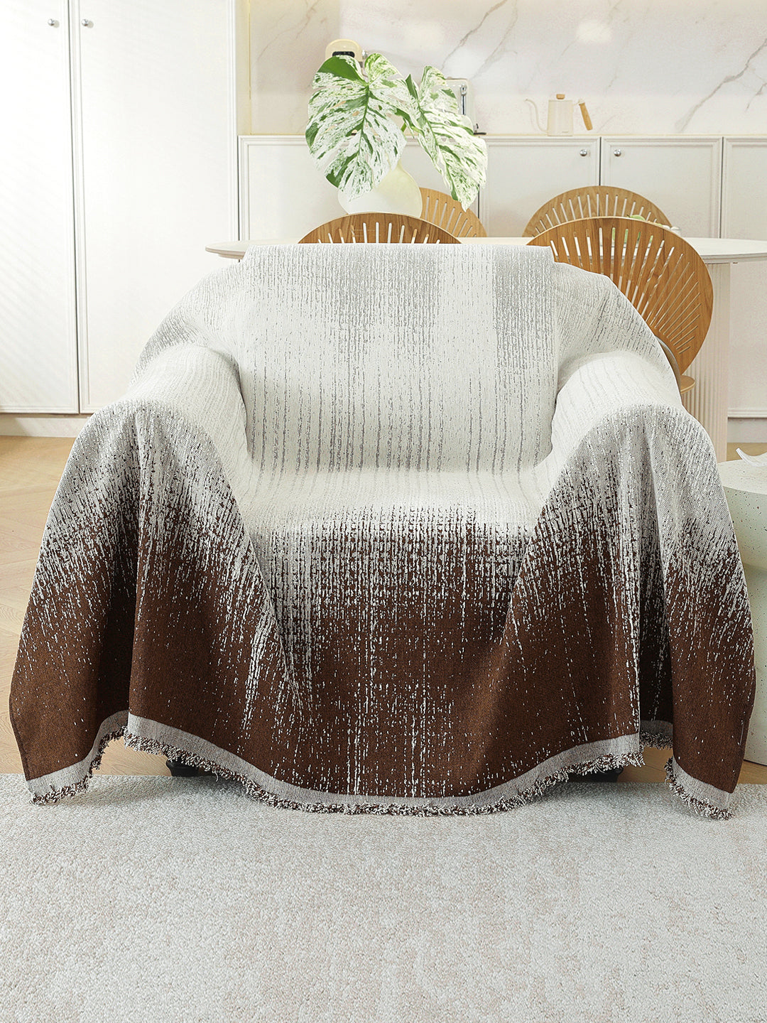 Chocolate Brown Ombre throw on a single seater sofa