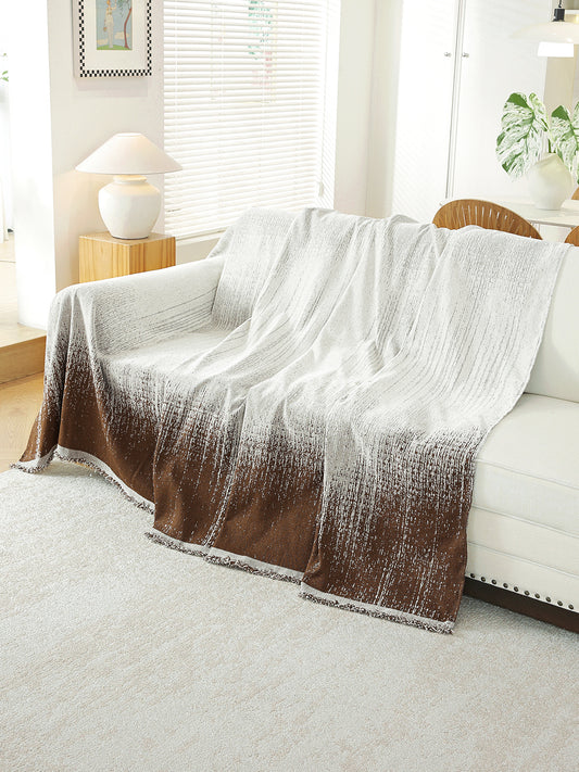 Chocolate Brown Ombre throw draped on a sofa