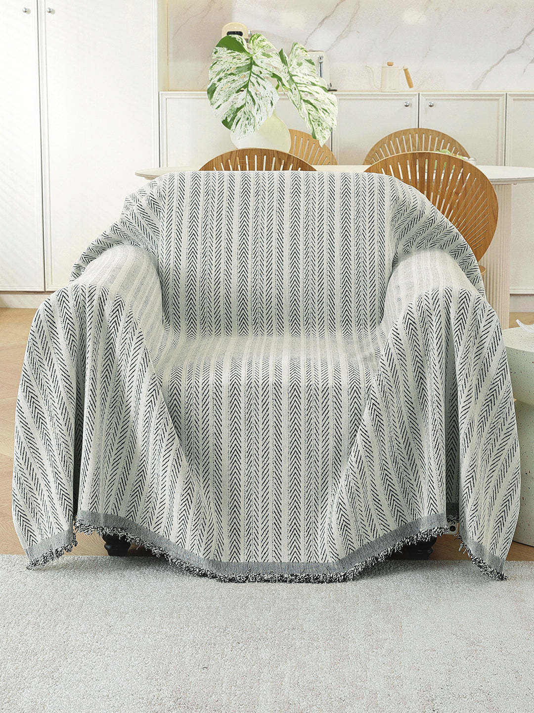 Light Grey Textured throw on a single seater sofa