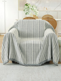 Light Grey Textured throw on a single seater sofa