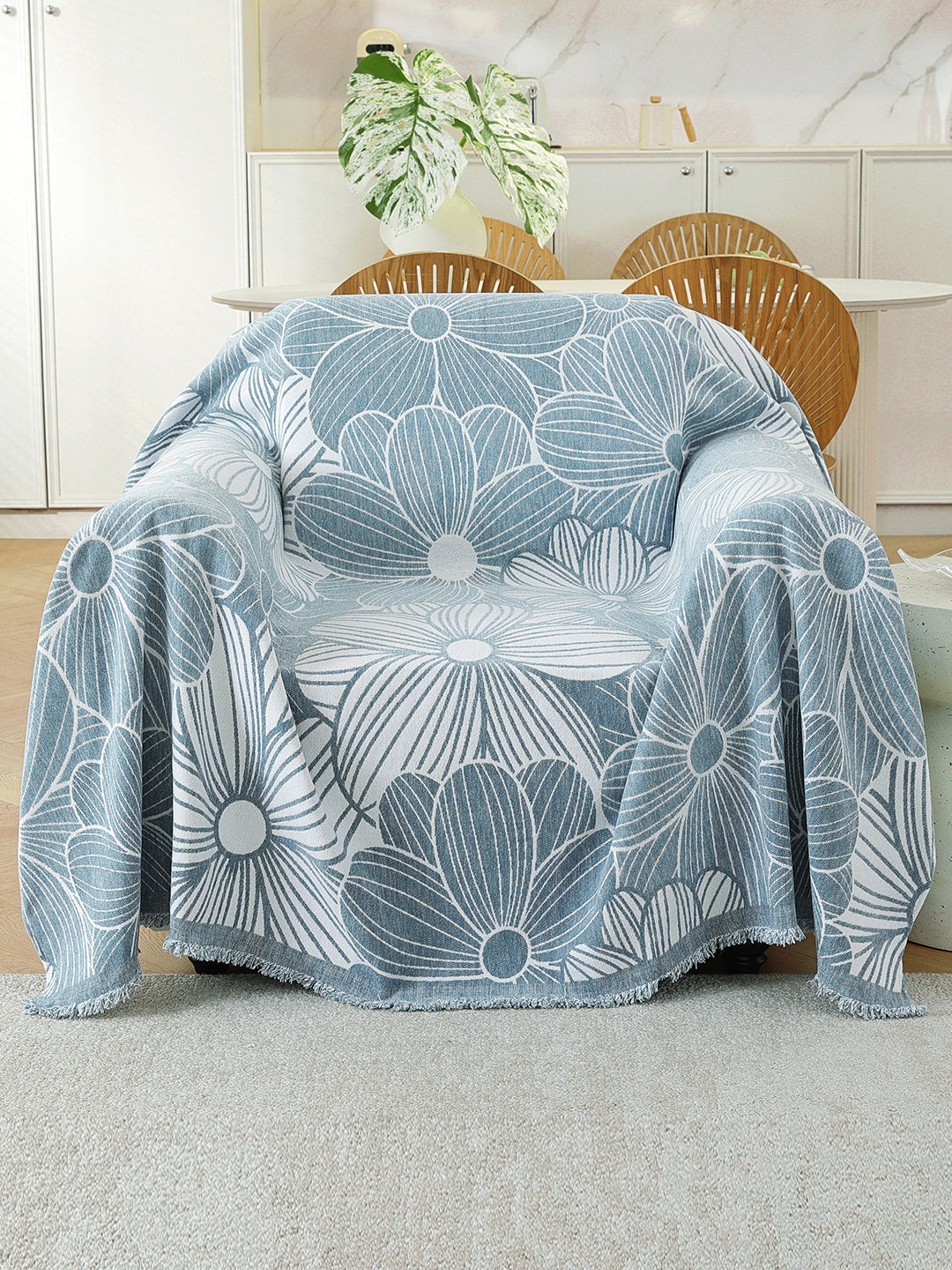 Powder Blue Floral throw on a single seater sofa