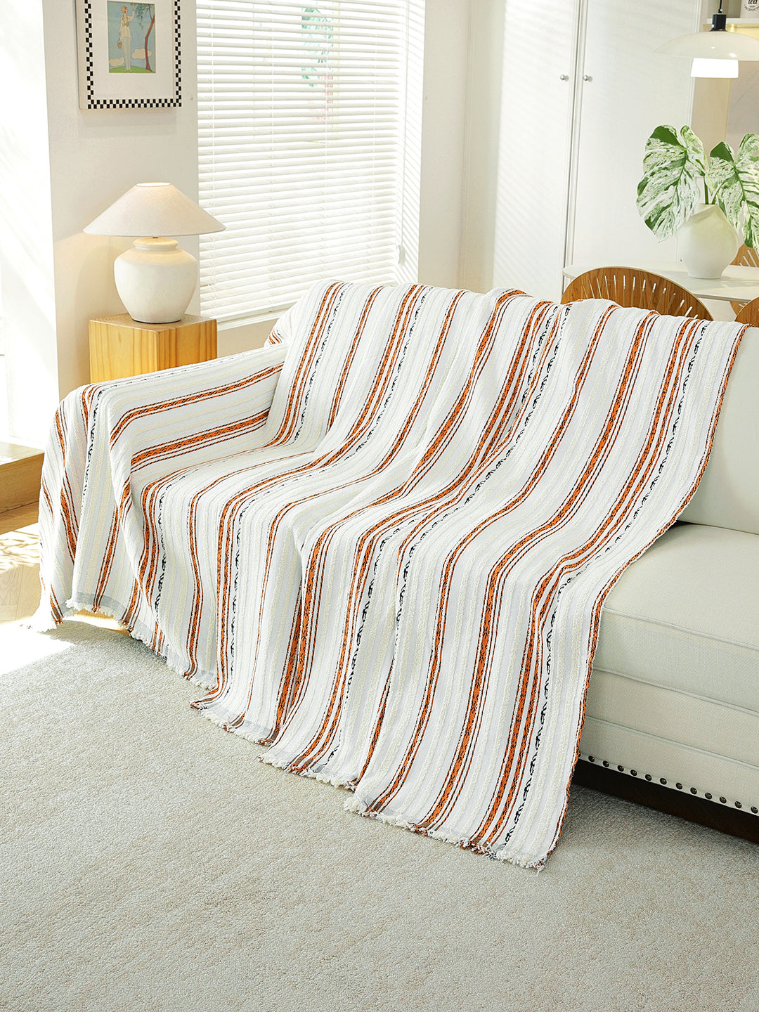 Rust & White Stripe throw draped on a sofa
