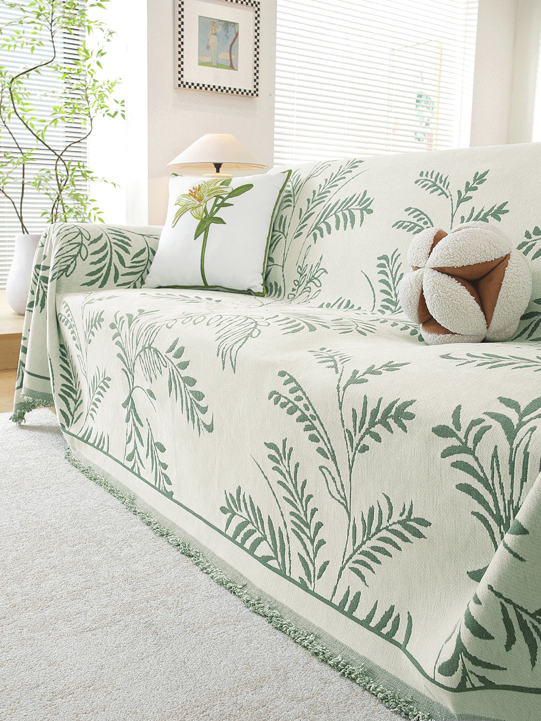 Sage Green Leaf premium chenille sofa throw on a 3 seater sofa